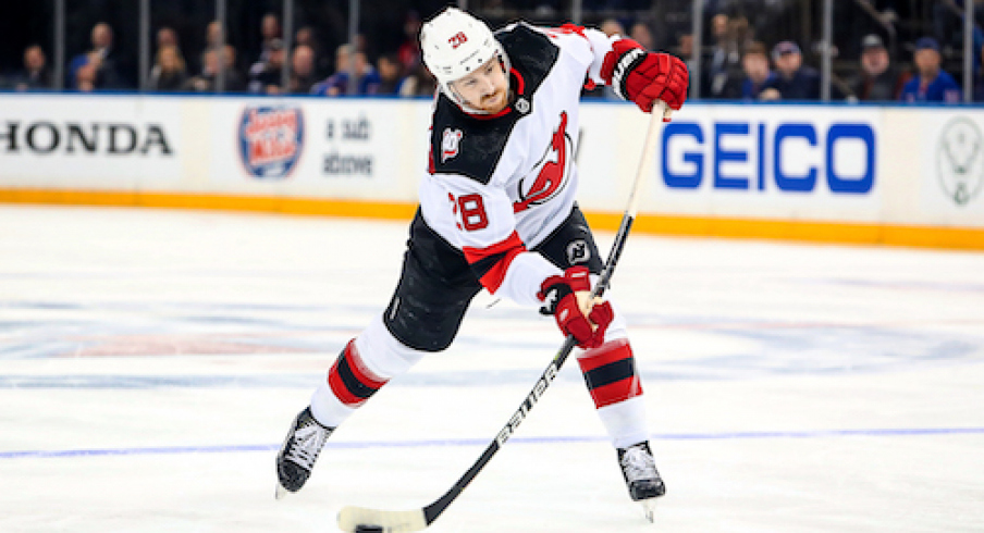 New Jersey Devils defenseman Damon Severson (28) takes a shot against the New York Rangers during the third period in game six of the first round of the 2023 Stanley Cup Playoffs at Madison Square Garden.