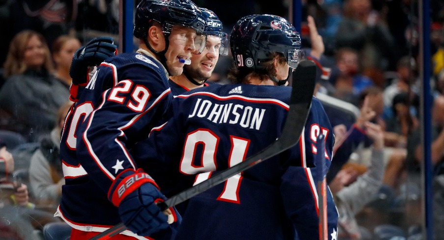 Columbus Blue Jackets left wing Patrik Laine (29) celebrates his goal with forward Kent Johnson (91) during the second period against the Pittsburgh Penguins at Nationwide Arena.