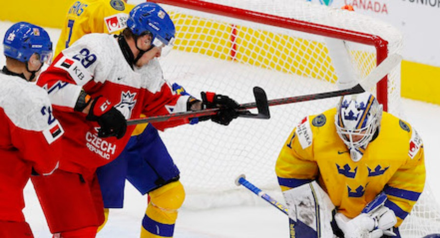 eam Sweden goaltender Jesper Wallstedt (1) makes a save while Team Czechia forward Martin Rysavy (29) looks for a rebound during the third period in the third place game during the IIHF U20 Ice Hockey World Championship at Rogers Place.