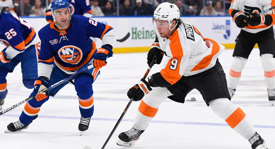 Philadelphia Flyers defenseman Ivan Provorov skates with the puck 