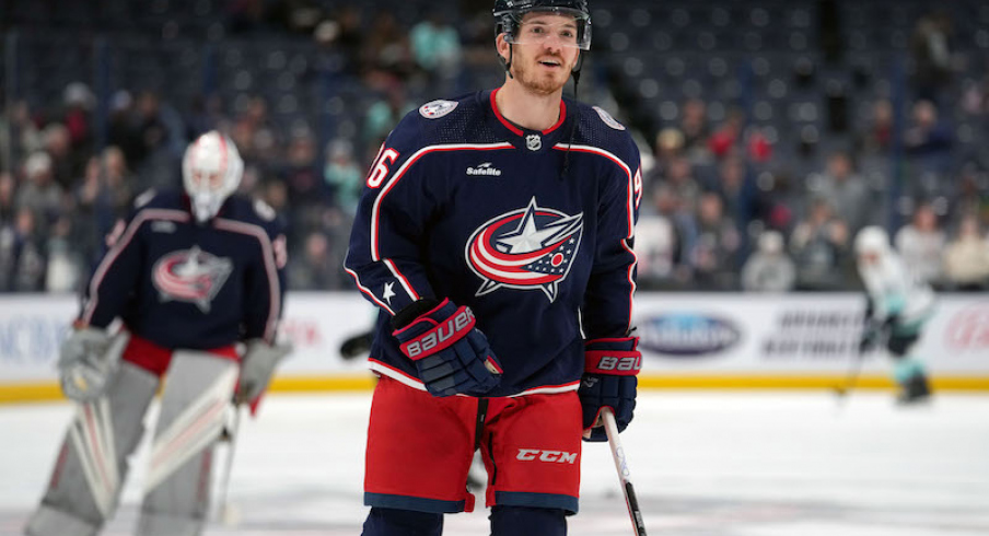 Columbus Blue Jackets' Jack Roslovic skates in warm-ups prior to the game against the Seattle Kraken at Nationwide Arena.