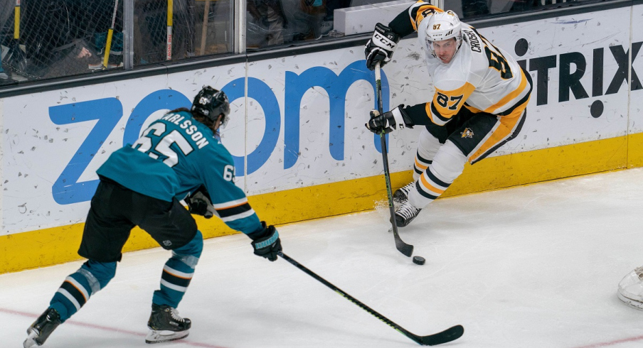 Pittsburgh Penguins center Sidney Crosby skates against former San Jose Sharks defenseman Erik Karlsson