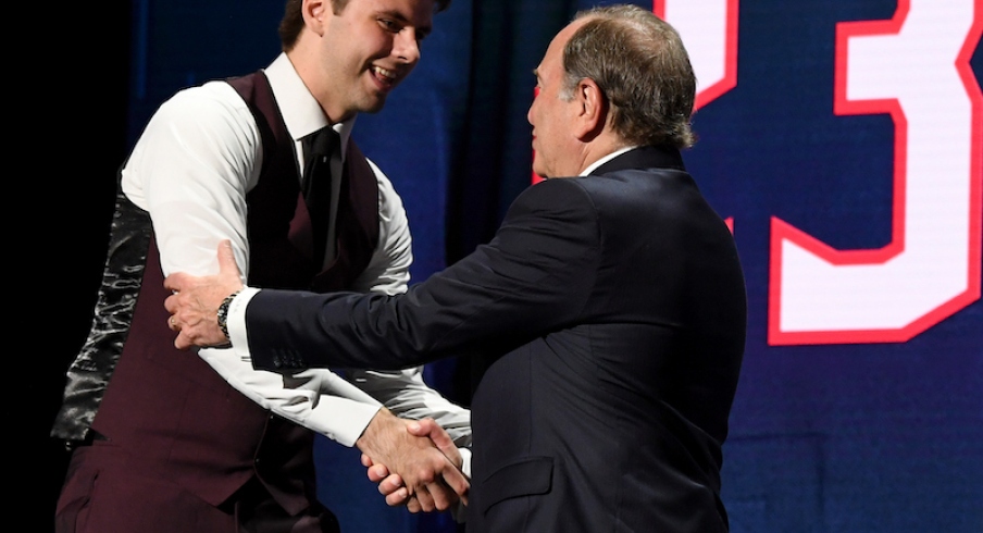 NHL commissioner Gary Bettman congratulates Columbus Blue Jackets second overall pick Adam Fantilli during round one of the 2023 NHL Draft at Bridgestone Arena.