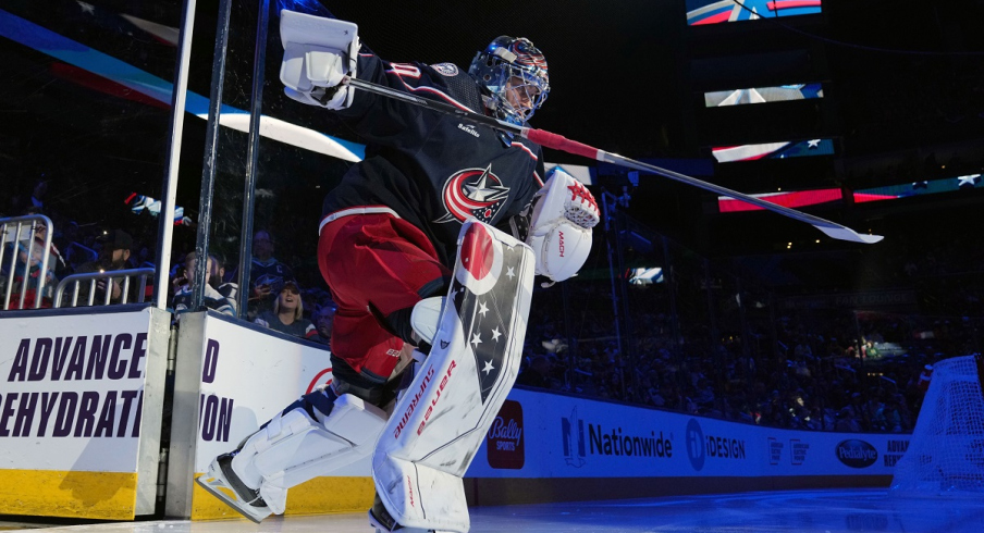 Elvis Merzlikins takes the ice before a game 