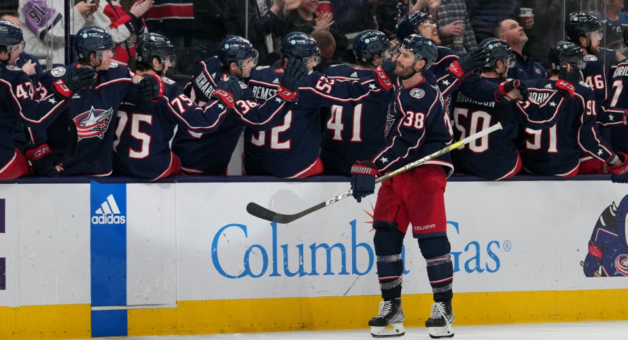 Boone Jenner celebrates a goal with his teammates