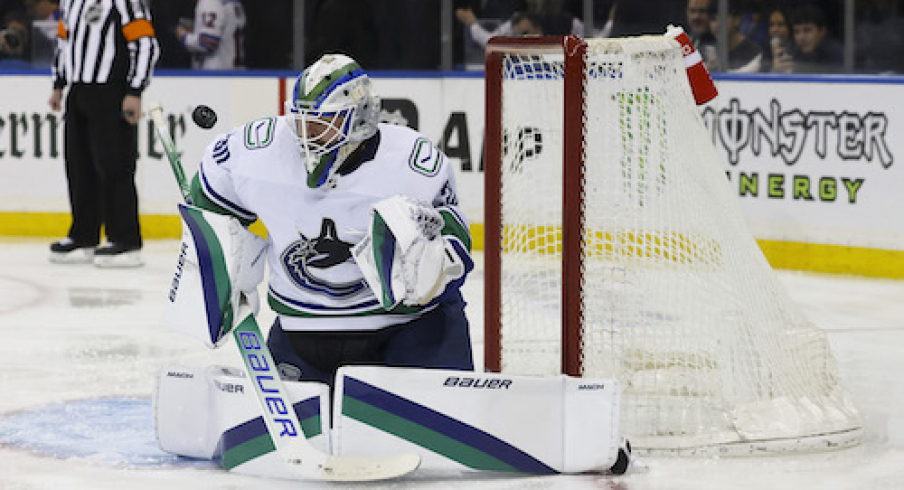 Vancouver Canucks goaltender Spencer Martin (30) makes a save against the New York Rangers during the second period of a game at Madison Square Garden.