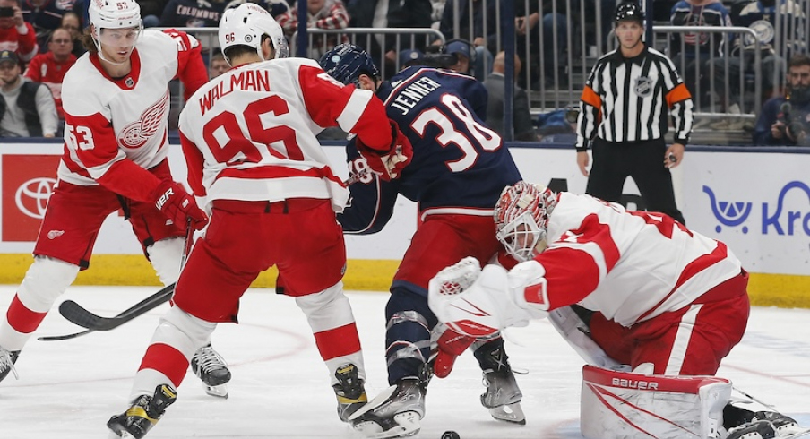 Detroit Red Wings' James Reimer tracks a rebound from a Columbus Blue Jackets shot during the second period at Nationwide Arena.