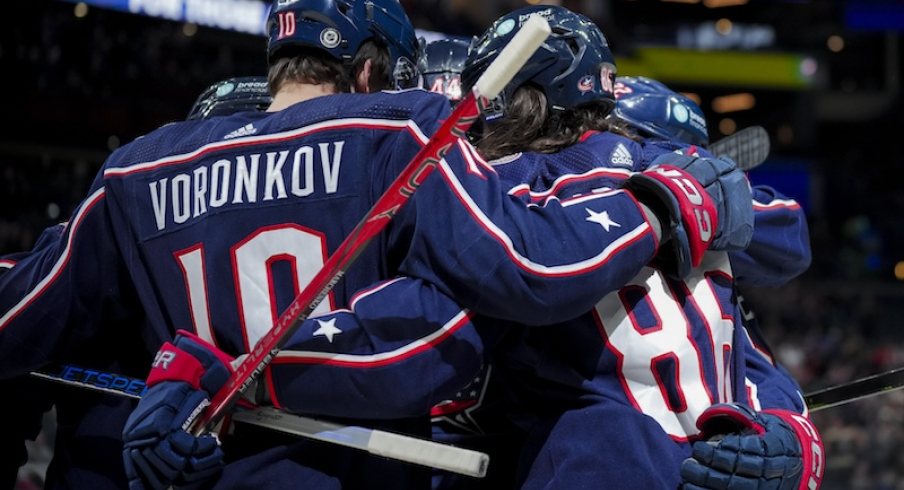 Columbus Blue Jackets' Kirill Marchenko celebrates with teammates after scoring a goal against the Tampa Bay Lightning in the first period at Nationwide Arena.