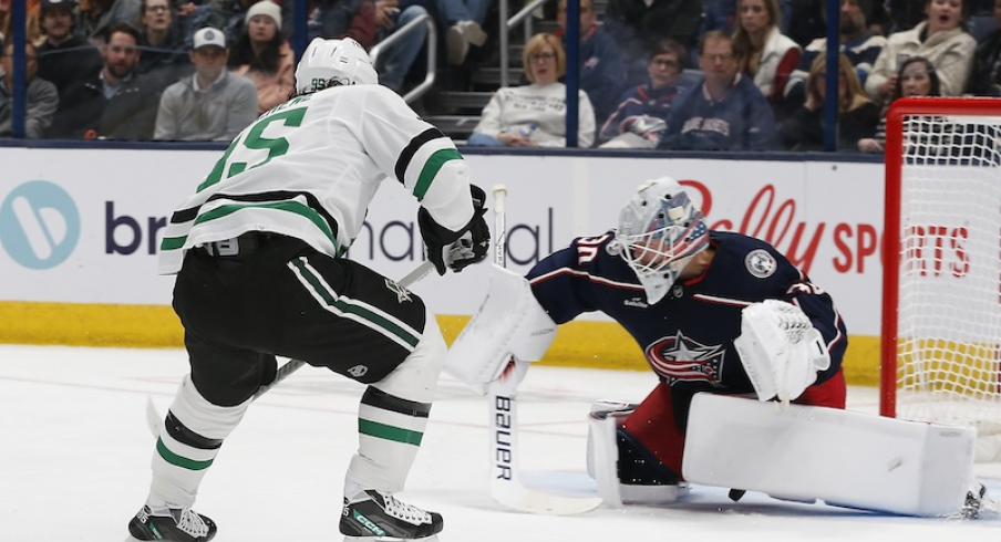 Dallas Stars' Matt Duchene slides the puck under Columbus Blue Jackets' Spencer Martin for a goal during the second period at Nationwide Arena.