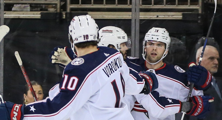 Columbus Blue Jackets center Adam Fantilli (11) celebrates with his teammates after scoring in the second period against the New York Rangers at Madison Square Garden.