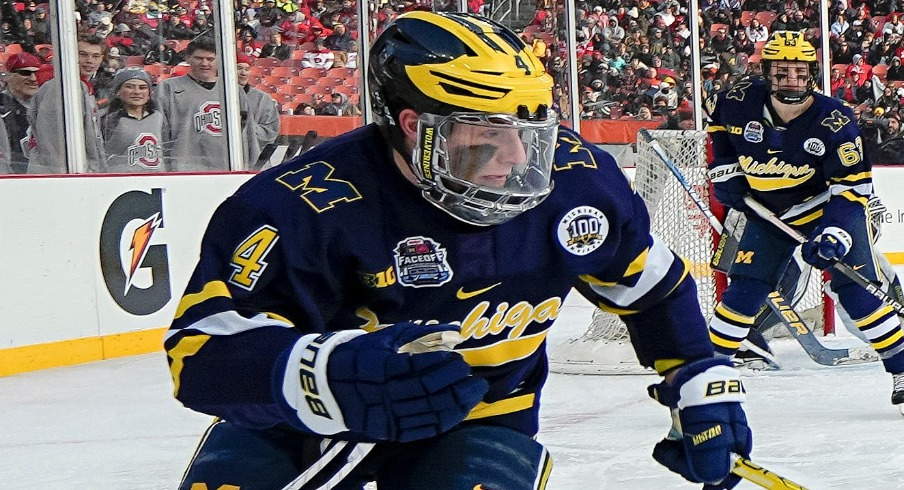 Michigan Wolverines forward Gavin Brindley (4) skates during the Faceoff on the Lake outdoor NCAA men s hockey game against the Ohio State Buckeyes at FirstEnergy Stadium.