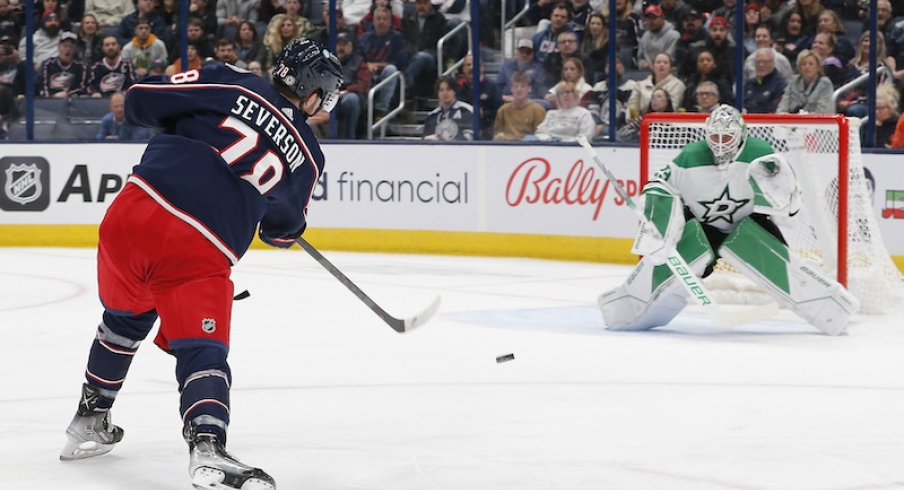 Columbus Blue Jackets' Damon Severson fires a shot Dallas Stars' Jake Oettinger during the first period at Nationwide Arena.
