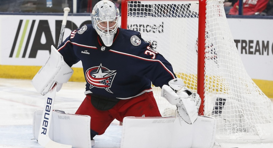 Columbus Blue Jackets' Spencer Martin makes a pad save against the Boston Bruins during the first period at Nationwide Arena.