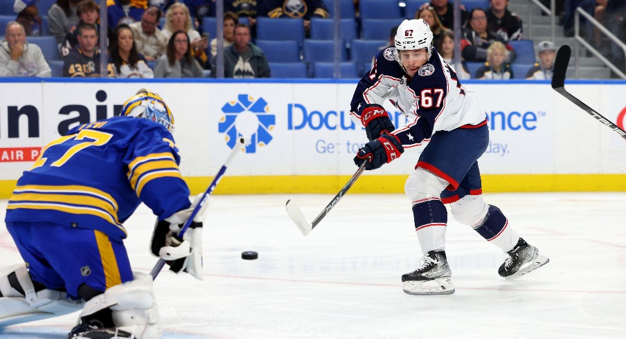 Columbus Blue Jackets left wing James Malatesta (67) takes a shot on Buffalo Sabres goaltender Devon Levi (27) during the first period at KeyBank Center. 