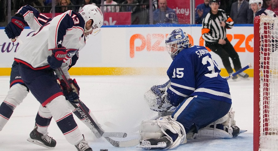 Toronto Maple Leafs goaltender Ilya Samsonov (35) makes a save against Columbus Blue Jackets forward Johnny Gaudreau (13) during overtime at Scotiabank Arena.
