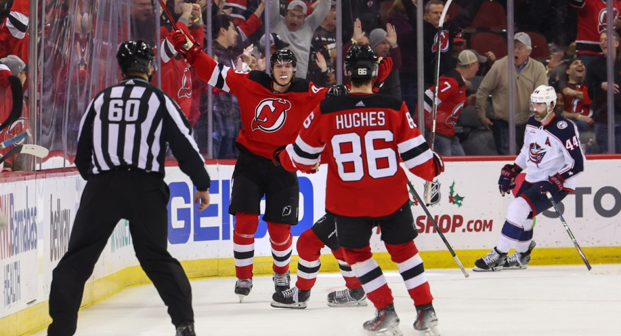 Luke Hughes celebrates his goal against the Columbus Blue Jackets