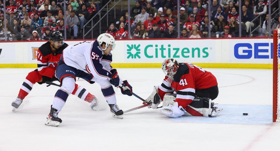 Columbus Blue Jackets right wing Yegor Chinakhov (59) scores a goal on New Jersey Devils goaltender Vitek Vanecek (41) during the third period at Prudential Center.