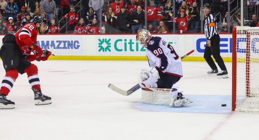 New Jersey Devils right wing Timo Meier (28) scores a goal on Columbus Blue Jackets goaltender Elvis Merzlikins (90) during overtime at Prudential Center.