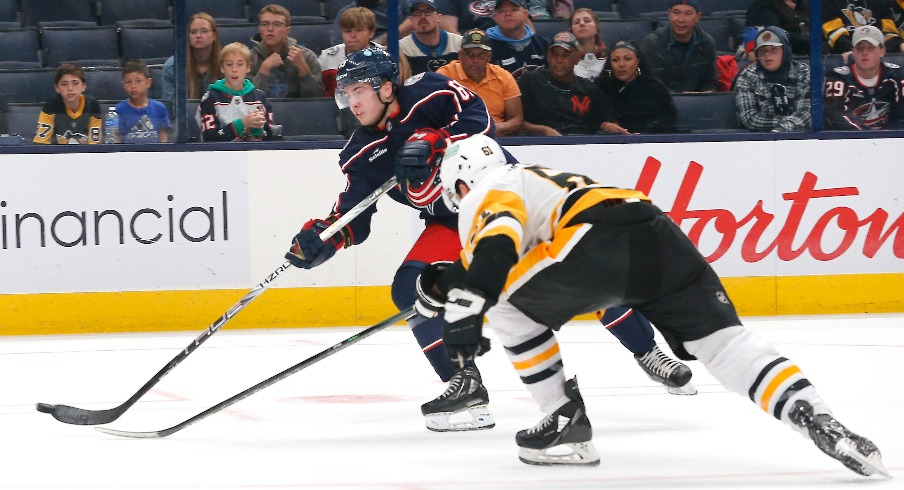 Columbus Blue Jackets right wing Jordan Dumais (69) scores the game winner in overtime against the Pittsburgh Penguins at Nationwide Arena.