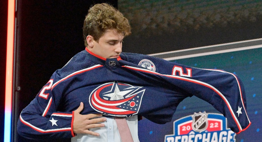 Denton Mateychuk after being selected as the number twelve overall pick to the Columbus Blue Jackets in the first round of the 2022 NHL Draft at Bell Centre.