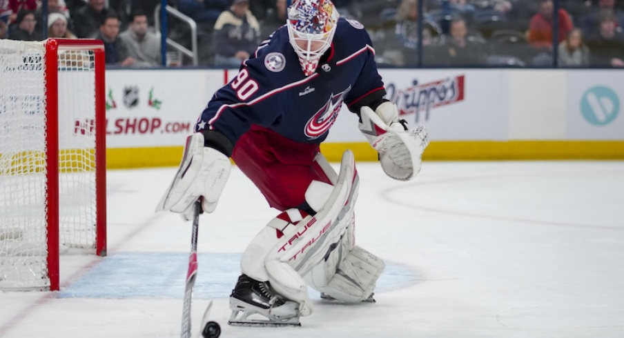 Columbus Blue Jackets' Elvis Merzlikins controls the puck against the Montreal Canadiens in the third period at Nationwide Arena.