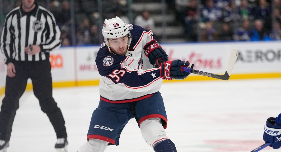 Columbus Blue Jackets defeneseman David Jiricek (55) shoots the puck past Toronto Maple Leafs forward Calle Jarnkrok (19) during the second period at Scotiabank Arena.