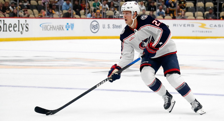 Columbus Blue Jackets defenseman Adam Boqvist (27) skates with the puck against the Pittsburgh Penguins in the shootout at PPG Paints Arena.