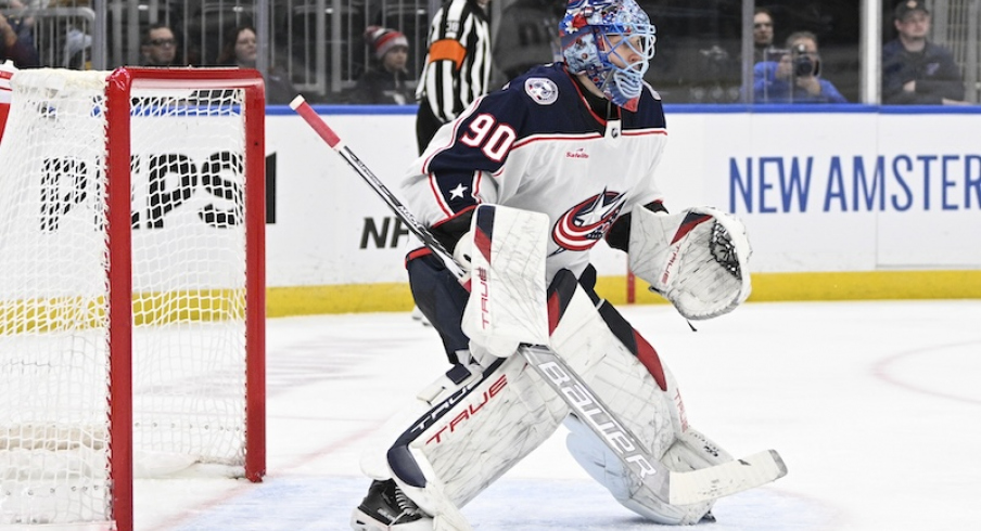 Columbus Blue Jackets' Elvis Merzlikins defends the net against the St. Louis Blues during the second period at Enterprise Center.