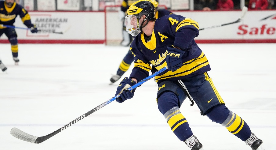 Michigan Wolverines forward Gavin Brindley (4) skates up ice during the NCAA men s hockey game against the Ohio State Buckeyesat Value City Arena.