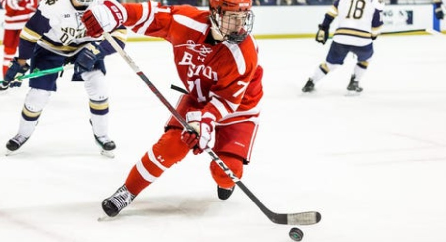 Boston University forward Macklin Celebrini (71) skates with the puck during the Boston University-Notre Dame NCAA hockey game on Saturday, October 21, 2023, at Compton Family Ice Arena in South Bend, Indiana.