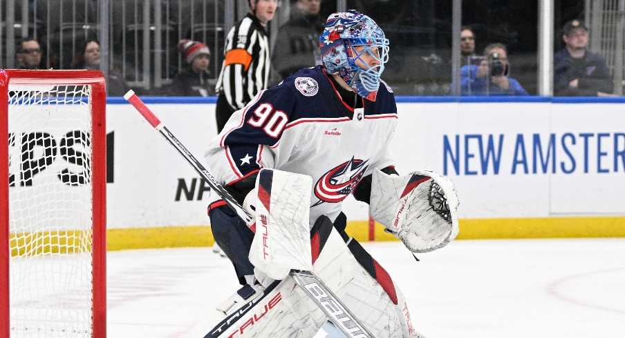 Columbus Blue Jackets goaltender Elvis Merzlikins (90) defends the net against the St. Louis Blues during the second period at Enterprise Center.