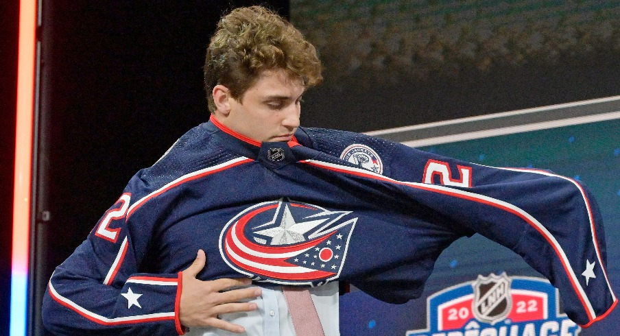 Denton Mateychuk after being selected as the number twelve overall pick to the Columbus Blue Jackets in the first round of the 2022 NHL Draft at Bell Centre.