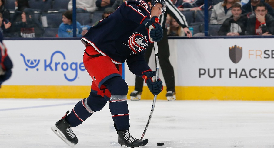 Columbus Blue Jackets right wing Yegor Chinakhov (59) wrists a shot on goal against the Tampa Bay Lightning during the second period at Nationwide Arena.