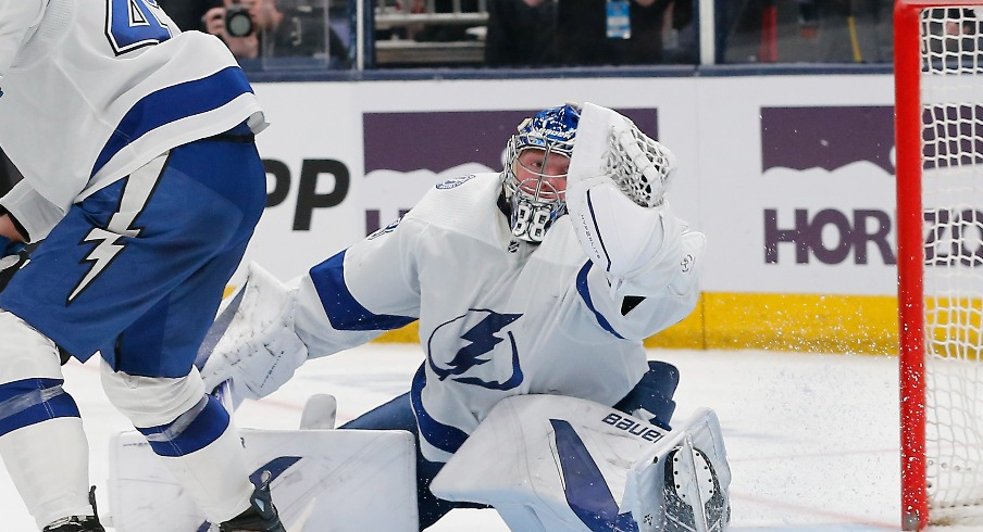 Tampa Bay Lightning goalie Andrei Vasilevskiy (88) makes a glove save against the Columbus Blue Jackets during the second period at Nationwide Arena.