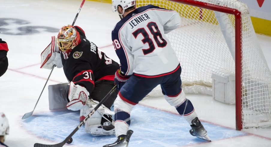 Ottawa Senators' Anton Forsberg makes a save on a shot from Columbus Blue Jackets' Boone Jenner in the third period at the Canadian Tire Centre.