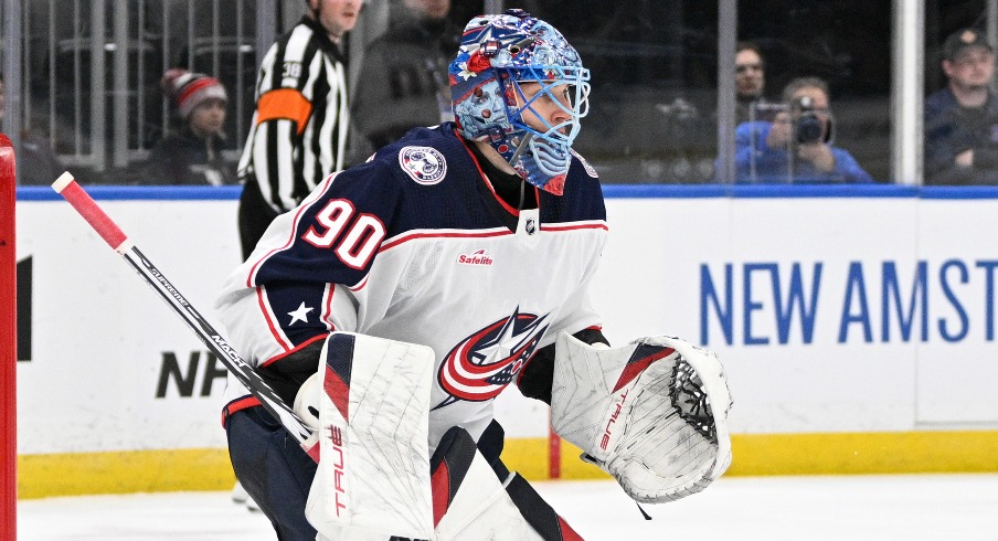 Columbus Blue Jackets goaltender Elvis Merzlikins (90) defends the net against the St. Louis Blues during the second period at Enterprise Center. 