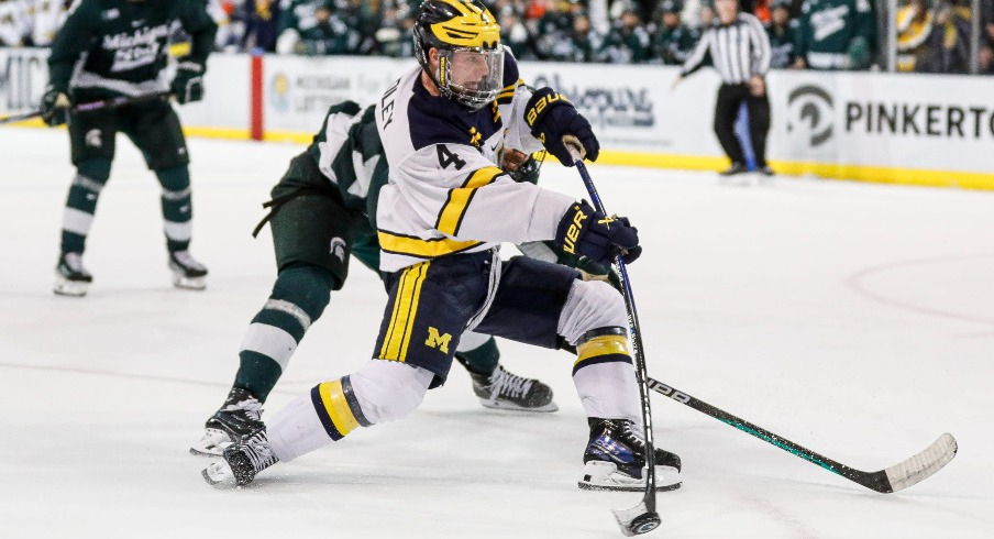 Michigan right wing Gavin Brindley shoots the puck against Michigan State during the third period at Yost Ice Arena in Ann Arbor on Friday, Feb. 9, 2024.