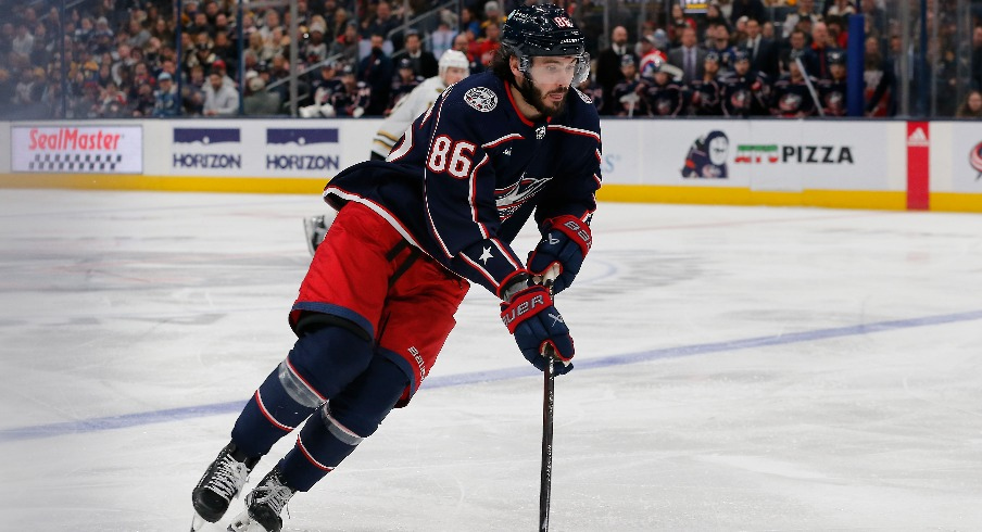 Columbus Blue Jackets right wing Kirill Marchenko (86) carries the puck against the Boston Bruins during the third period at Nationwide Arena.