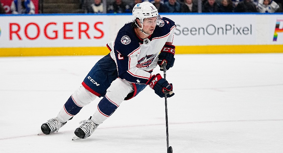 Columbus Blue Jackets defenseman Andrew Peeke (2) carries the puck against the Toronto Maple Leafs at Scotiabank Arena.