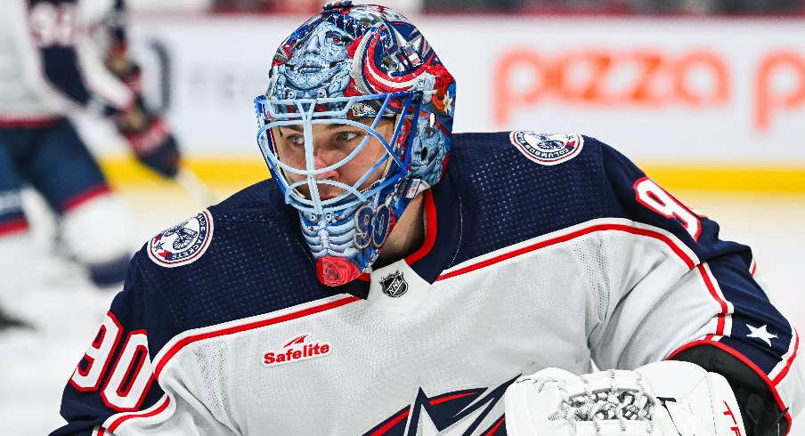 Columbus Blue Jackets goalie Elvis Merzlikins (90) looks on during warm-up before the game against the Montreal Canadiens at Bell Centre.