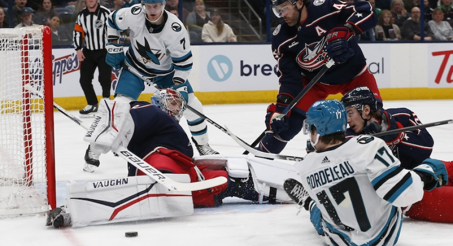 Columbus Blue Jackets' Daniil Tarasov makes a pad save on the shot from San Jose Sharks' Thomas Bordeleau during the first period at Nationwide Arena.