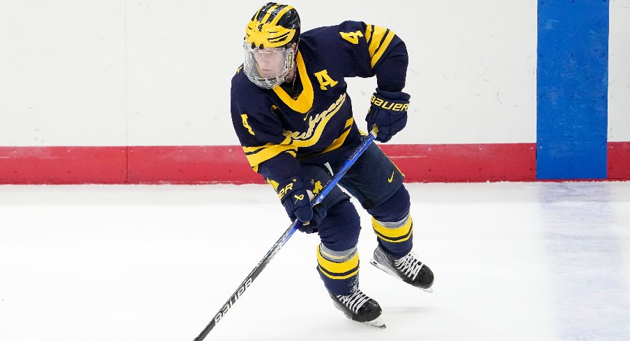 Michigan Wolverines forward Gavin Brindley (4) skates during the NCAA men s hockey game against the Ohio State Buckeyes at Value City Arena.