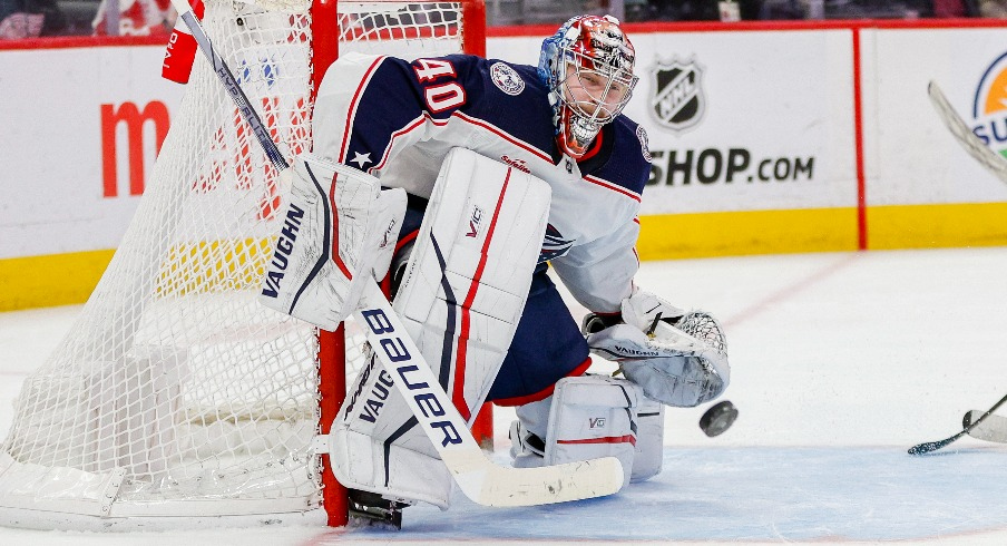 Columbus Blue Jackets goaltender Daniil Tarasov (40) attempts to block a shot during the third period of the game against the Detroit Red Wings at Little Caesars Arena.