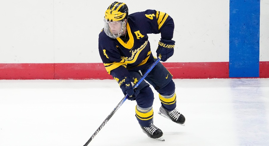 Michigan Wolverines forward Gavin Brindley (4) skates during the NCAA men s hockey game against the Ohio State Buckeyes at Value City Arena.