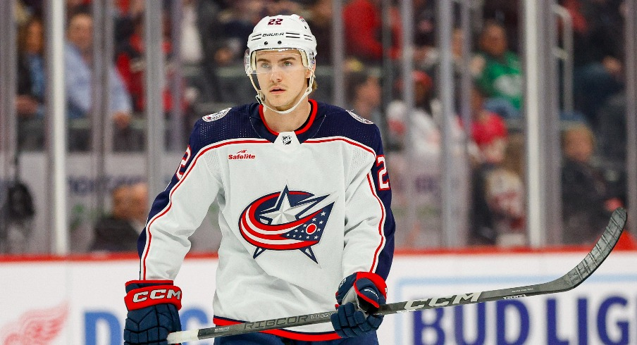 Columbus Blue Jackets defenseman Jake Bean (22) looks on during the first period of the game against the Detroit Red Wings at Little Caesars Arena.