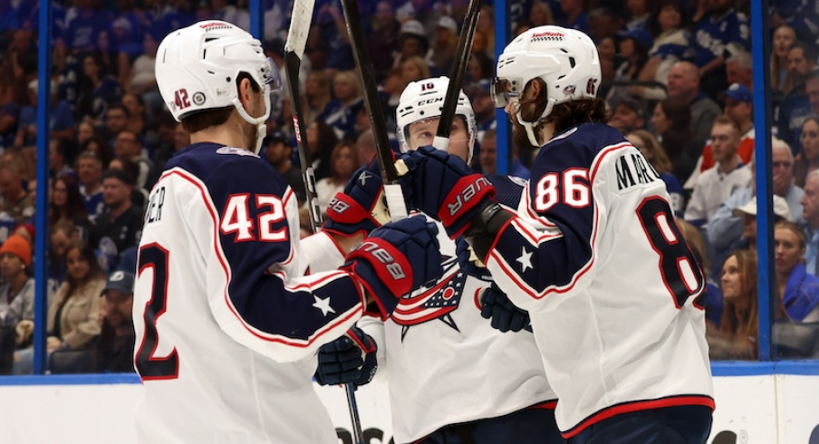Columbus Blue Jackets' Kirill Marchenko is congratulated after he scored a goal against the Tampa Bay Lightning during the second period at Amalie Arena.