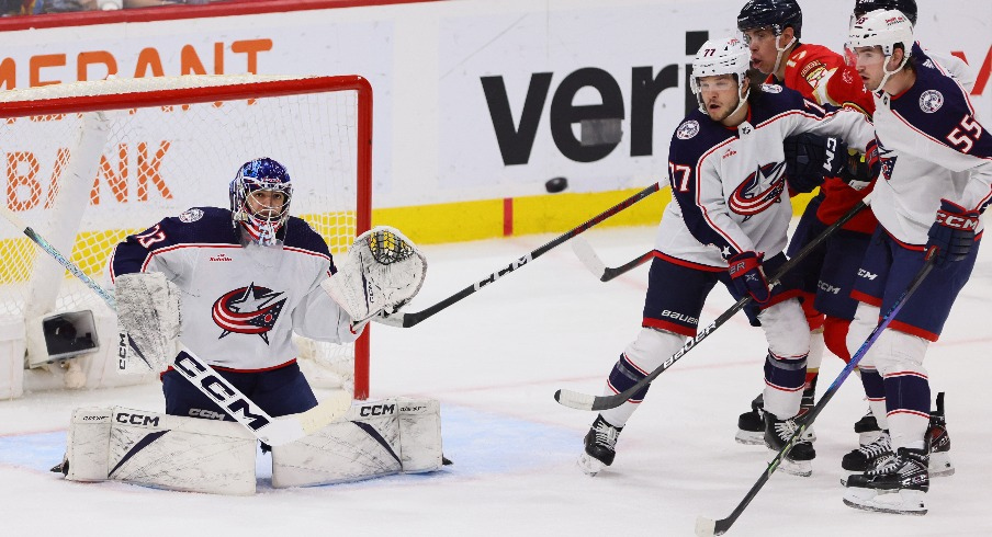 Columbus Blue Jackets goaltender Jet Greaves (73) defends his net against the Florida Panthers during the third period at Amerant Bank Arena.