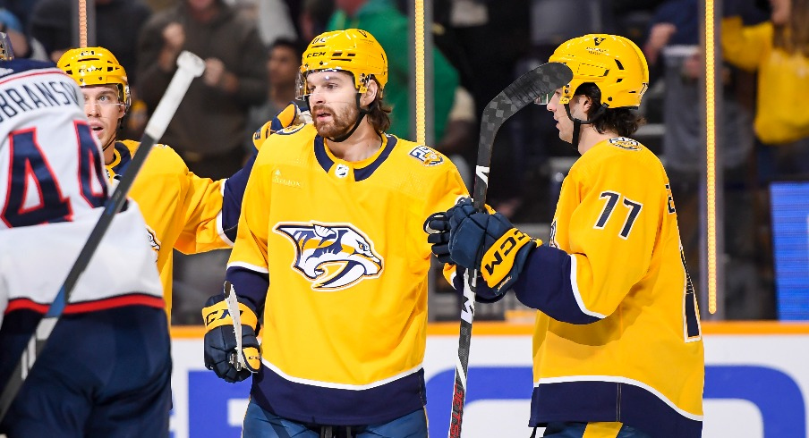 Nashville Predators center Tommy Novak (82) celebrates his goal against the Columbus Blue Jackets during the first period at Bridgestone Arena.