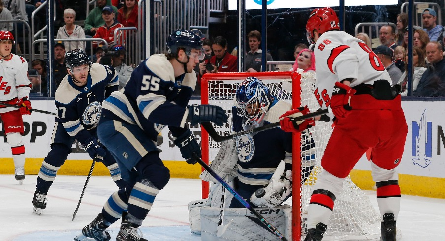 Columbus Blue Jackets goalie Jet Greaves (73) stops the shot attempt of Carolina Hurricanes center Martin Necas (88) during the first period at Nationwide Arena.