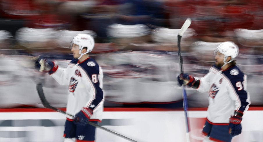 Zach Werenski celebrates after scoring a goal 